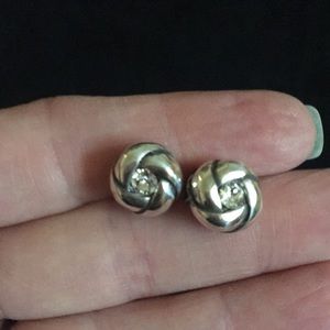 Silver stud earrings with center rhinestone